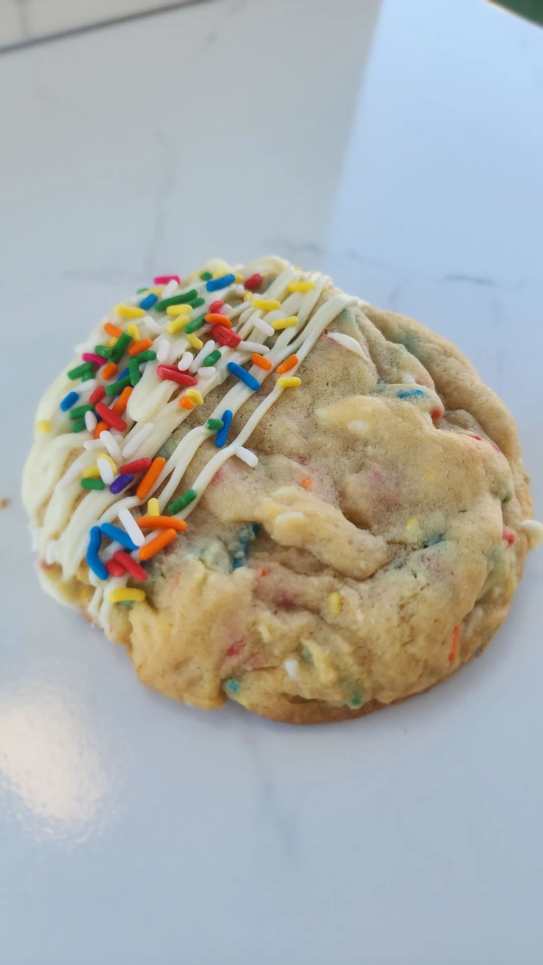 The Velvet Whisk funfetti cookie with colorful sprinkles